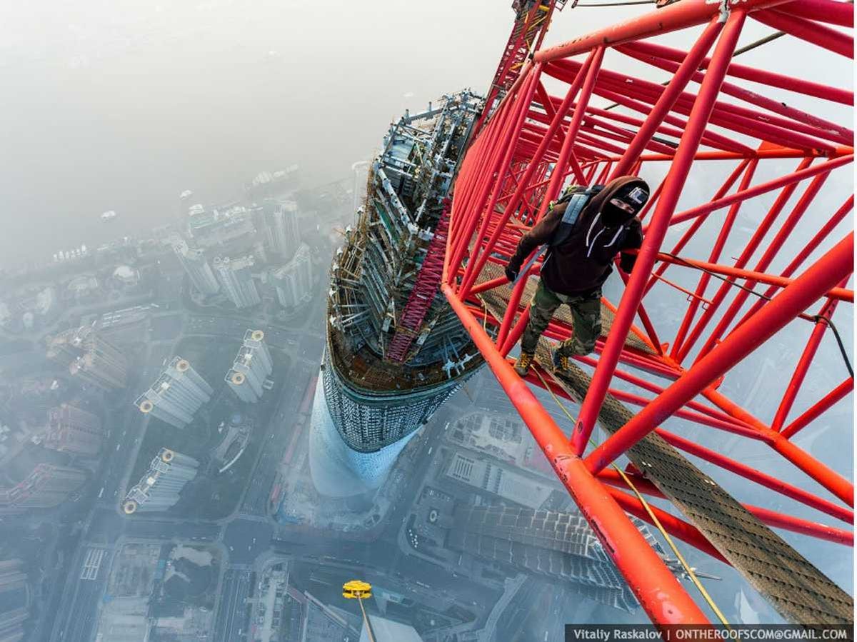 the-pair-also-climbed-650-meters-2130-feet-to-the-top-of-one-of-chinas-tallest-skyscrapers-the-shanghai-tower-three-elevators-send-passengers-up-to-the-sightseeing-platform-but-the-photographers-decided-to-climb-the-construction-cranes-that-were-there-at-the-time-instead.jpg